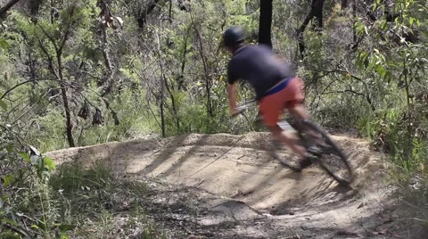 Mountain Biker hitting a berm 스톡 동영상 46947974