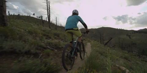 Mountain Biker On Mountain Trail 스톡 동영상 105888451