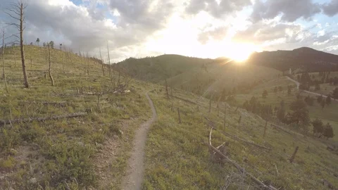 Mountain Biker On Mountain Trail 스톡 동영상 105889281