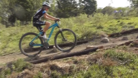 Mountain Biker on an MTB trail cycle race Stockbeeldmateriaal 86730769