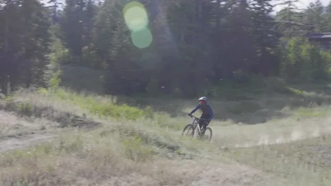Mountain Bikers- Catching air Stock Footage 140942653