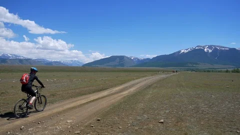 Mountain bikers in mountains of Altay Stock Footage 101880427