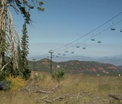Mountain biking man pedal down trail, lift above Stock Footage 21670597