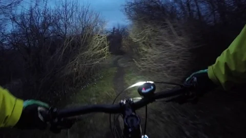 Mountain biking at night Stock Footage 82427720