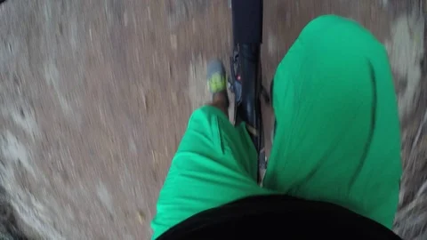 Mountain biking peddeling point of view. Puddle reflection. Stock Footage 82323212