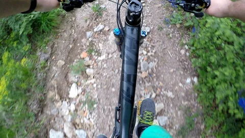 Mountain biking on rocks Stock Footage 89968328