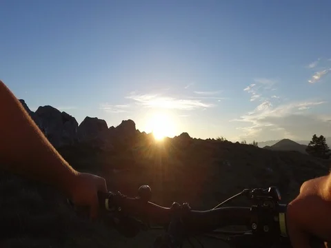 Mountain biking at sunset Stock Footage 82357753