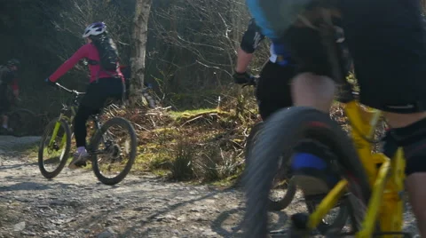 Mountain biking switchbacks climb Stock Footage