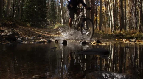 Mountain Biking Through Water Video stock 39420973