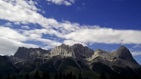 Mountain blue sky and rolling clouds timelapse 4K Stock Footage