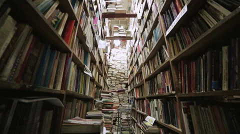 Mountain of books in library Stock Footage