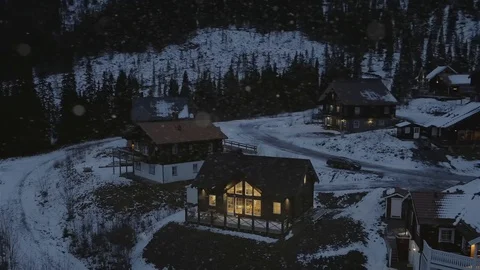 Mountain cabin at snowfall Stock Footage