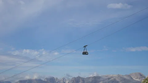 Mountain cable car ascent to peacks. Beautiful alpine background. Stock Footage 136710479
