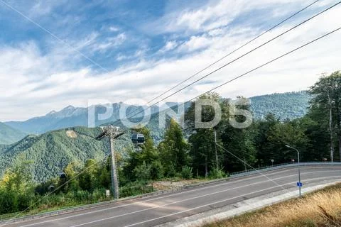 Mountain cableway. Beautiful morning summer landscape Stock Photos