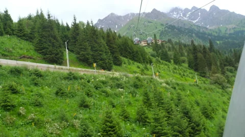 Mountain cableway cloudy summer day Stock Footage 296005128