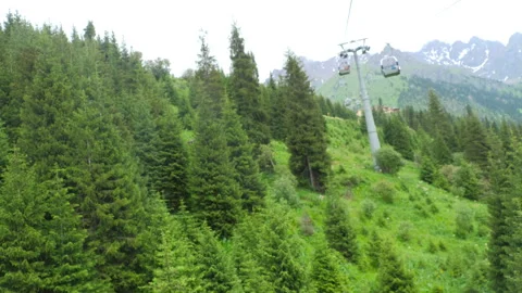 Mountain cableway cloudy summer day Video stock 296238701