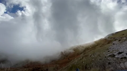 Mountain canyon with fast moving clouds. Video stock 142734453