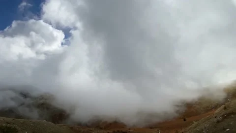 Mountain canyon with fast moving clouds. Video stock 142734516