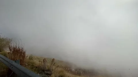Mountain canyon with fast moving clouds. Stock Footage 142734629