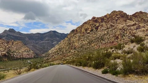 Mountain canyon moving long u-turn Stock Footage 156973044