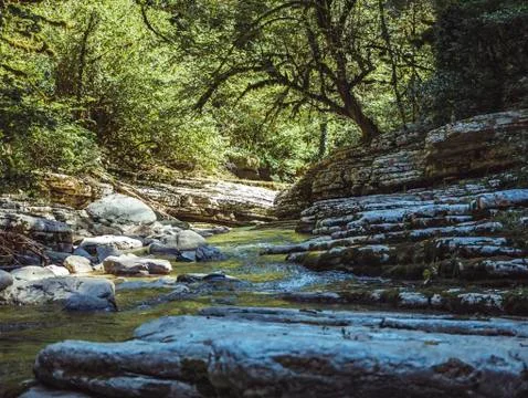 Mountain canyon river reflection stream rocks. Фото