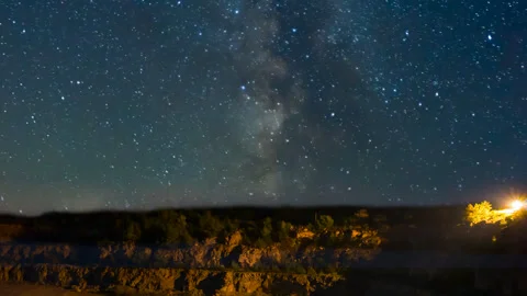 Mountain canyon under a starry sky with milky way Stock Footage 240744559