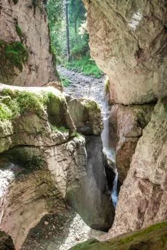 Mountain cave entry Stock Photos