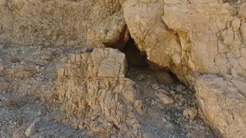 Mountain with a cave.Mountains near the dead sea.Road to the Dead Sea. Stockbeeldmateriaal 83878101