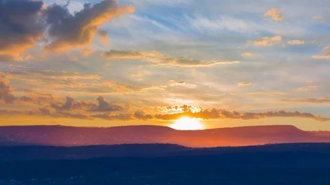 Mountain chain silhouette at the sunset, time lapse scene Stock Footage 102220988