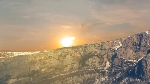 Mountain chain in a snow at the sunset, time lapse scene Stock Footage 146689044