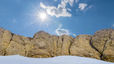 Mountain chain in snow under a sparkle sun Video stock 314794382