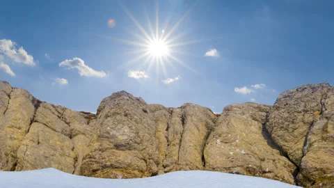 Mountain chain in snow under a sparkle sun Видео 343605421