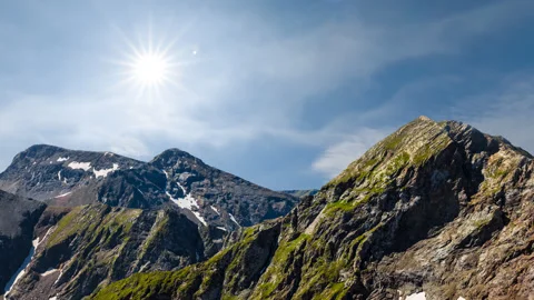 Mountain chain under a sparkle sun Stock Footage 312371721