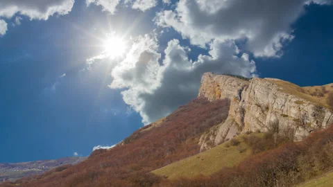 Mountain chain under a sparkle sun Video stock 316293560