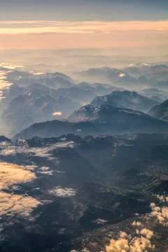 Mountain chains in the sunset Stock Photos