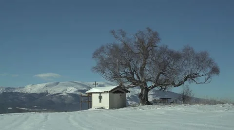 Mountain Church Person Walking in the Snow 4K Stock Footage 59771867