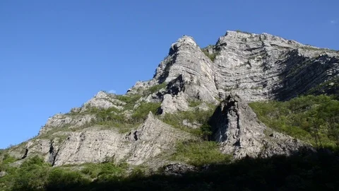 Mountain cliff and rock. Cliffs mountain ridge Stock Footage 88715417