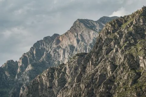 Mountain cliff close-up, clouds over the mountains, Stock Photos