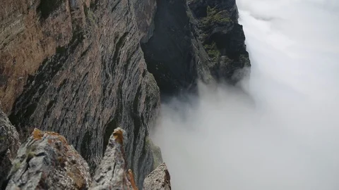 Mountain Cliff Landscape Seen Through Semitransparent Scud Clouds Stock-Footage 87749815