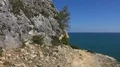 Mountain cliff panning to open sea at Algarve coastline Portugal 4k or 4k+ Resolution