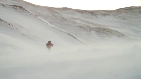 Mountain Climber in blizzard Stock Footage 73878541