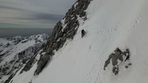 Mountain Climber drone shot Stock Footage 155915986