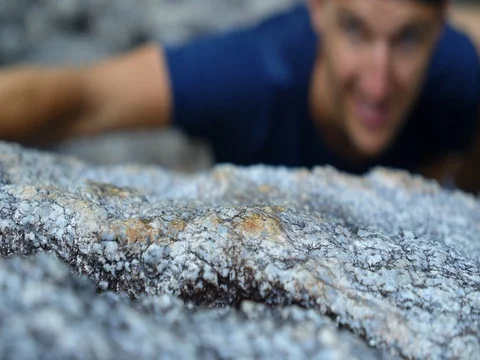 Mountain Climber Man Reaching The Top Doing His Best Video stock 78647720