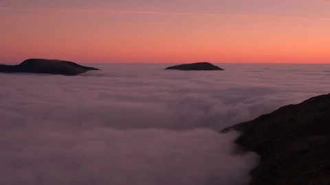 A mountain cloud inversion at dawn in Snowdonia, Wales Stock Footage 319672046