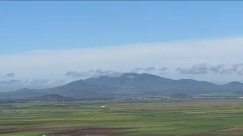 Mountain with a Cloud Necklace Stock Footage 314344362