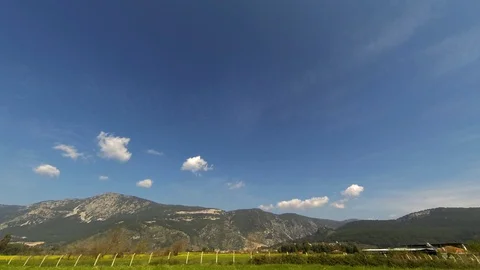 Mountain Cloud Time Lapse on a Clean Sky Stock Footage 87786025