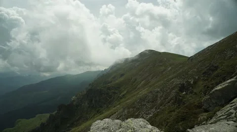 Mountain Clouds and Rocks Timelapse 4K Stock Footage 64209899