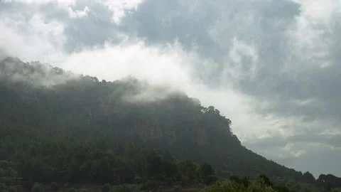 Mountain in the clouds, Mallorca, Majorca, Balearic Islands, Spain Stock Footage 303754029