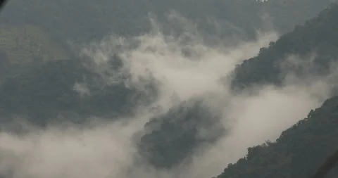 Mountain Clouds Nestled in the Valleys Stock Footage 290356405