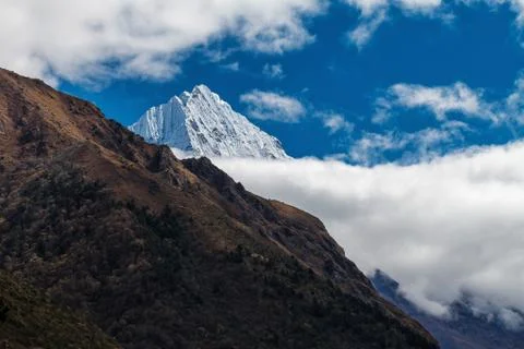Mountain in the clouds Stock Photos